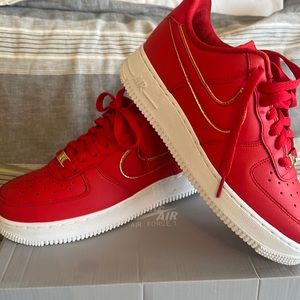 Nike women’s Air Force 1 red and gold